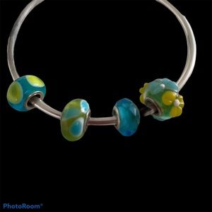 Four (4) Pandora inspired charms